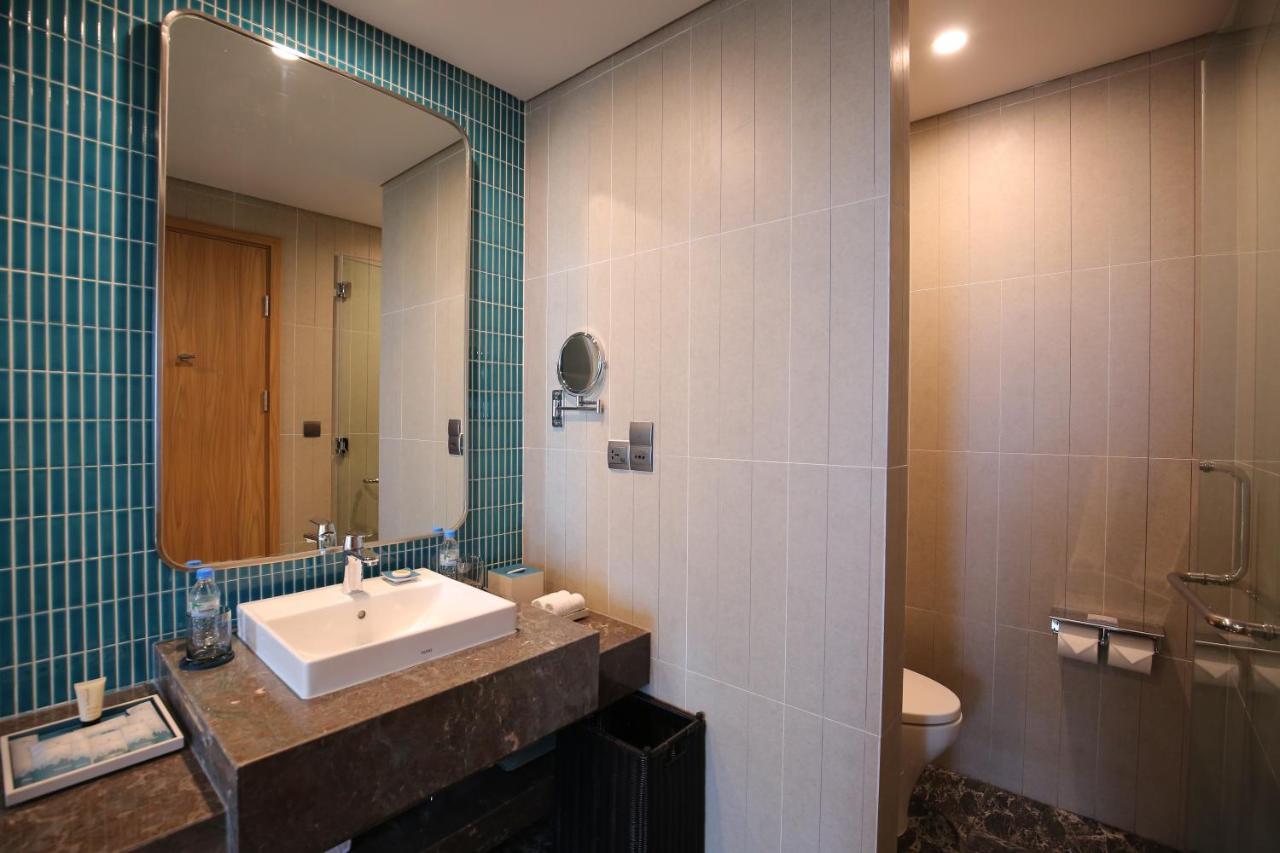 Flc City Hotel Beach Куинён Экстерьер фото